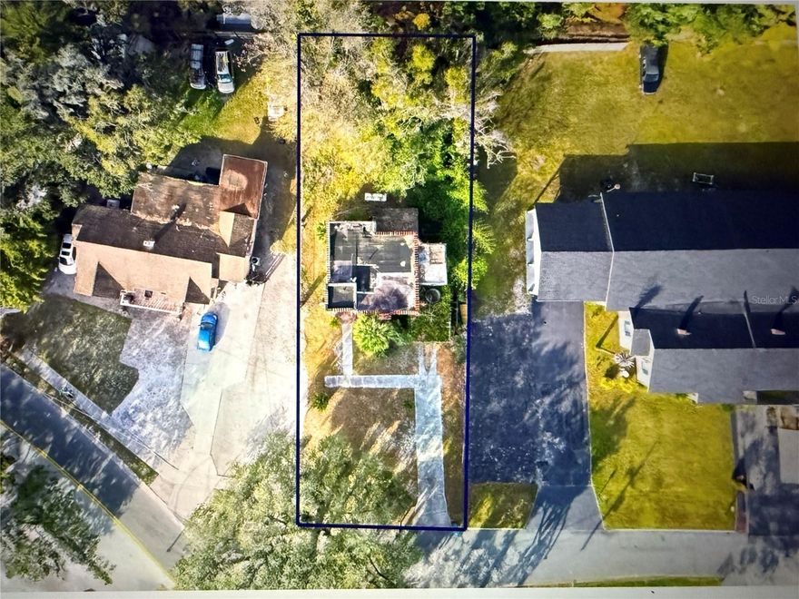 Short Sale. THERE'S A HOUSE ON THE LOT, THAT NEEDS COMPLETE DEMOLITION.