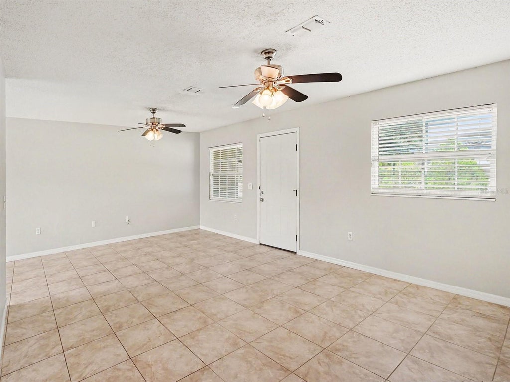 Photo of 3255 Kelvington Drive, Orlando, FL 32810 (MLS # O6417658)