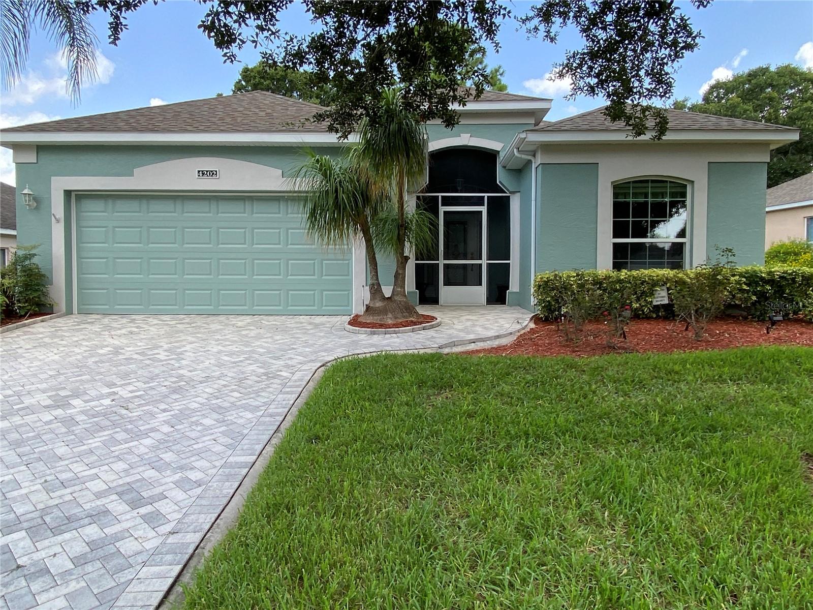 Beautiful St Regis model located on the Main Golf course. This is a very well maintained home, Roof replaced 2016, Newer A/C -Heating system, New Windows. Newly remodeled Kitchen with all Brand New Stainless steel Appliances & Master Bathroom was also remodeled, New Garage Door, New Rear Patio pavers, as well as the driveway & walk. Freshly painted 2023, New Engineered wood flooring spill proof throughout. New luxury Vinyl Flooring in Kitchen. 2 solar tubes were installed in the Livingroom / Dining area and 1 was installed in the Master Bathroom. Kings Ridge is 55+ gated community, with the spacious Club House with 3
heated pools, spas. There are many activities like tennis, pickle ball. & shuffleboard. There are also many clubs to choose from to join. You can golf cart your way to the nearby Plaza for dining and shopping.