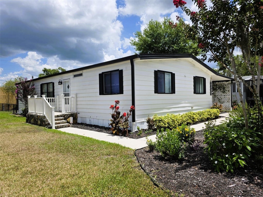 Photo of 21052 Little Magens Loop, Lutz, FL 33558 (MLS # W7883203)