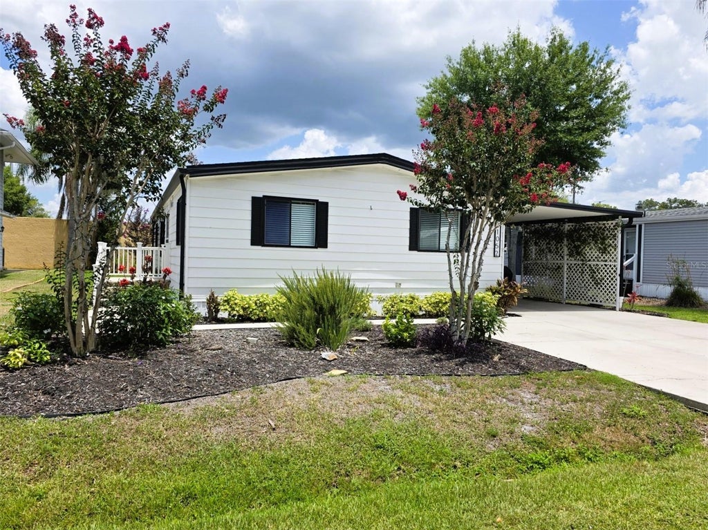 Photo of 21052 Little Magens Loop, Lutz, FL 33558 (MLS # W7883203)
