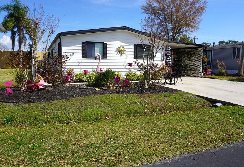 Photo of 21052 Little Magens Loop, Lutz, FL 33558 (MLS # W7883203)