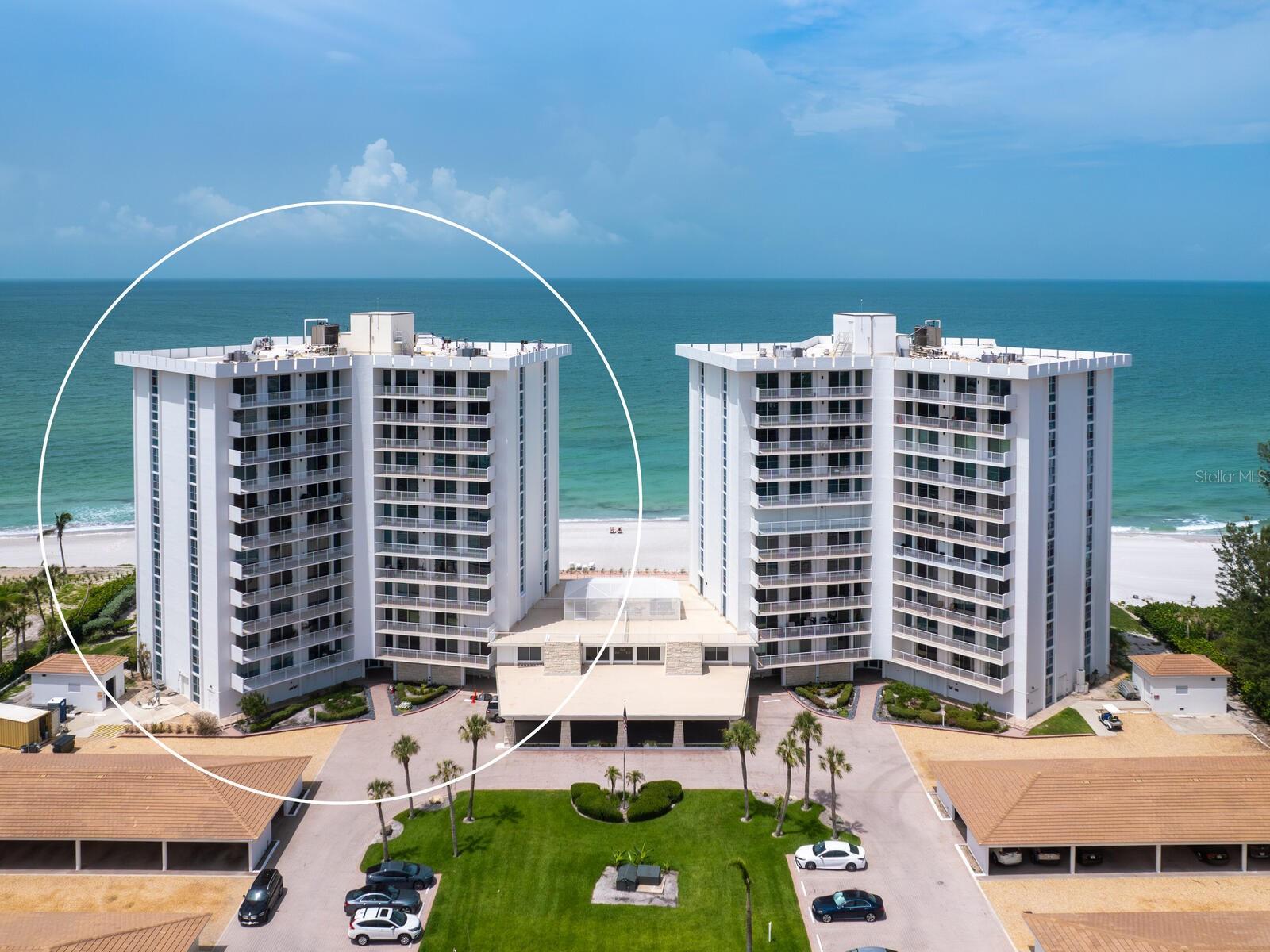 Sought-After Beachfront Living at The Islander Club – Resort-Style Luxury on Longboat Key. Welcome to this beautifully updated 2-bedroom, 2-bath condo in the prestigious Islander Club, one of Longboat Key’s most desirable beachfront communities. Located on the 6th floor, this spacious residence spans over 40 feet along the south/southeast side, offering breathtaking Gulf views from the primary suite and the perfect setting for relaxed coastal living. Inside, you'll find new luxury engineered wood flooring throughout, fresh coastal-inspired paint, and updated lighting that complements the open floor plan. The bright and airy living space flows effortlessly from the kitchen to the main living area, while large impact windows in the primary bedroom bring in stunning natural light and uninterrupted Gulf views. The primary suite also features an ensuite bath, and there is a full-size washer and dryer in-unit along with extra storage off the living room for added convenience. The Islander Club offers an array of resort-style amenities including over 400 feet of private beach frontage, two fishing jetties, two Har-Tru tennis courts, a newly renovated community room with a full-size kitchen, billiards, table tennis, a library, fitness center, saunas, and on-site management and maintenance. A beautiful beachfront heated swimming pool and spa add to the luxury experience. Located just a short bike ride or drive to the Longboat Key Club, you’ll have easy access to exceptional dining, golf, tennis, and pickleball. The world-renowned shops and restaurants of St. Armands Circle are less than four miles away and easily reached by bike or car. Don’t miss the opportunity to enjoy the best of turnkey beachfront living and experience the ultimate in daily relaxation here on Longboat Key—just bring your flip flops and move right in.