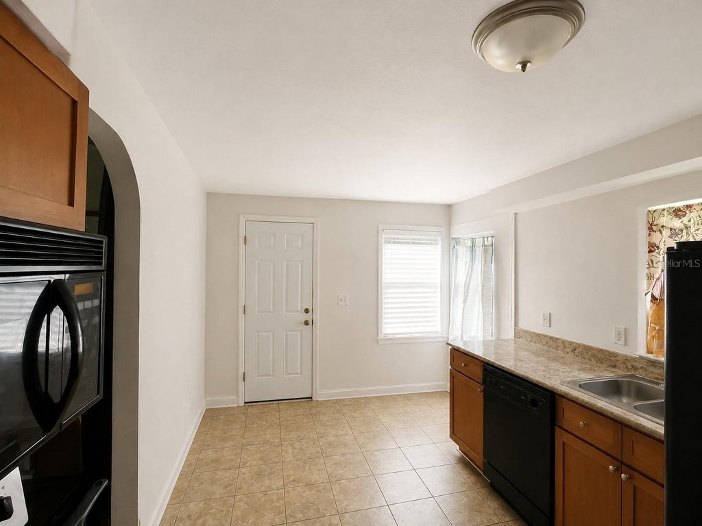 Photo of 1044 58th Avenue N, St Petersburg, FL 33703 (MLS # TB8536421)