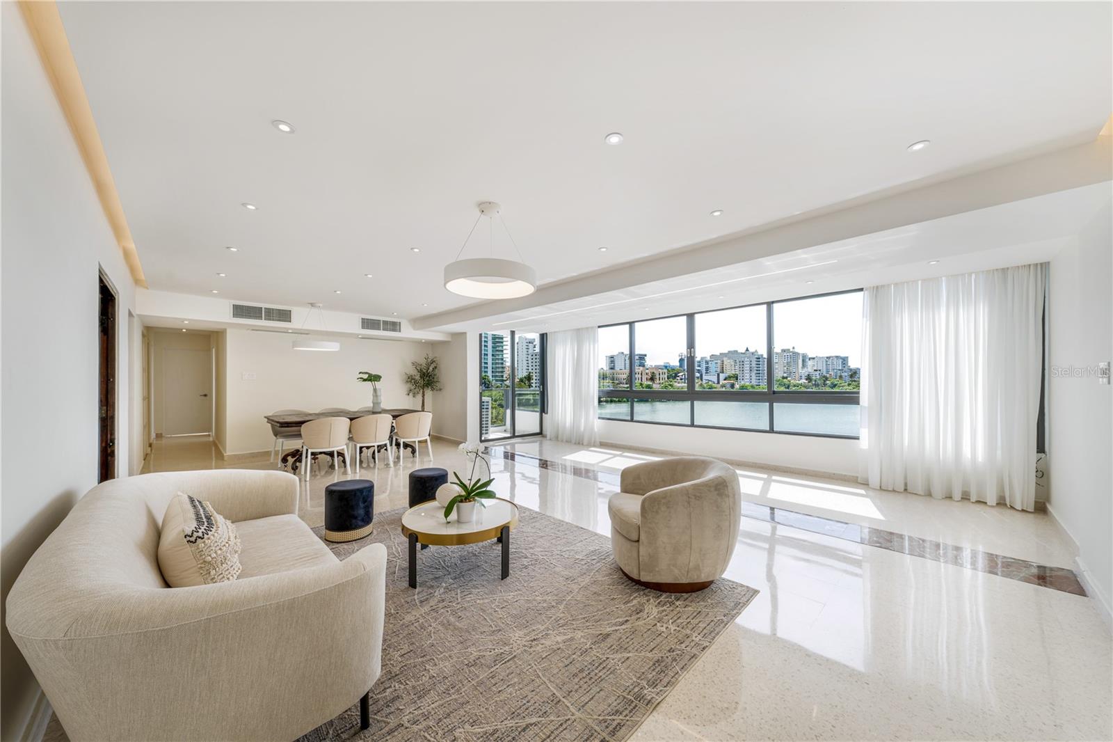 Available for showings starting on August 4th, 2025. Elegant 3-bed, 3-bath apartment in Condado Beach with stunning lagoon views that serve as the ideal backdrop for a spectacular metropolitan lifestyle. This 4th-floor residence with approx. 1,740 Sq. Ft. affords top-quality windows and furniture, in addition to a modern kitchen with stainless steel appliances and an abundance of natural light in every space. The great room is tastefully furnished and seamlessly connects to the fully-equipped galley kitchen and balcony with scenic vistas. The primary bedroom is ensuite and features a generously sized layout. Contemporary design elements, an inviting atmosphere and one covered parking space complete and accent this exceptional home. Del Mar condominium offers residents coveted amenities such as a pool, basketball court, security, partial generator and water cistern. The building is desirably located just moments away from the best nightlife, fine dining, shopping venues and beaches. Del Mar is also within close proximity to Saint John's School and Robinson School. Condado Beach is a highly-esteemed community within the island's thriving capital. Near Isla Verde, Old San Juan and the Miramar Arts District. Experience city living in the Caribbean at its finest.