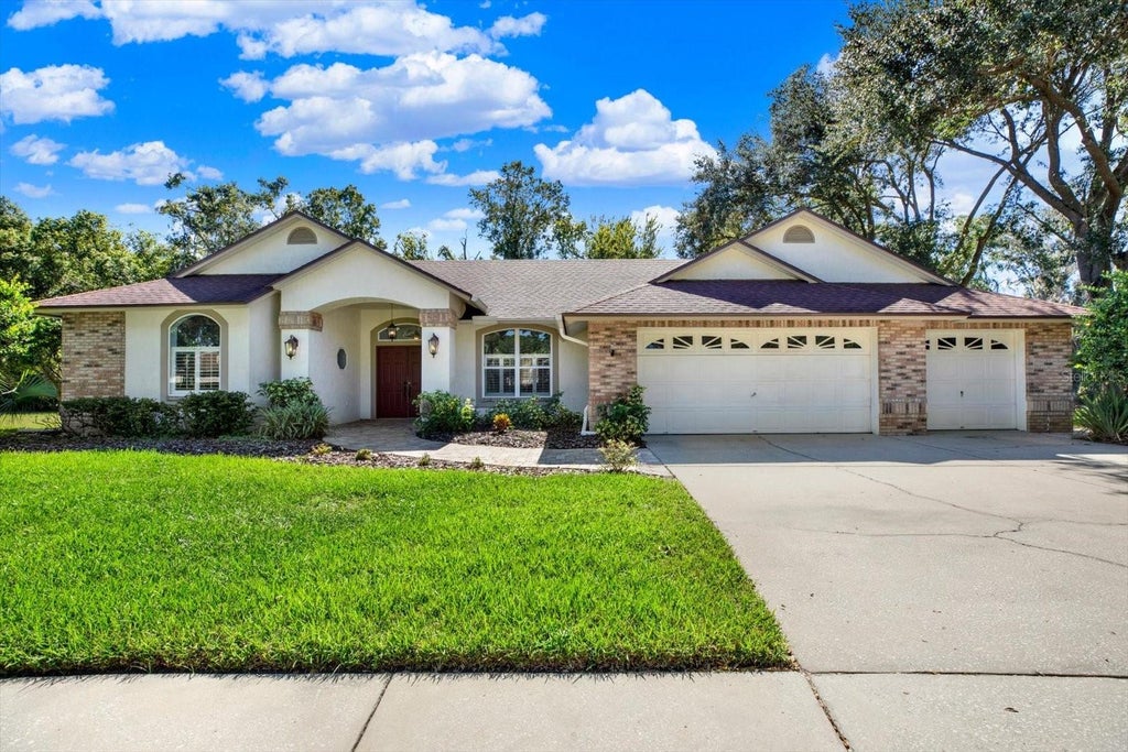 Photo of 507 Surrey Lane, Lutz, FL 33549 (MLS # TB8561070)