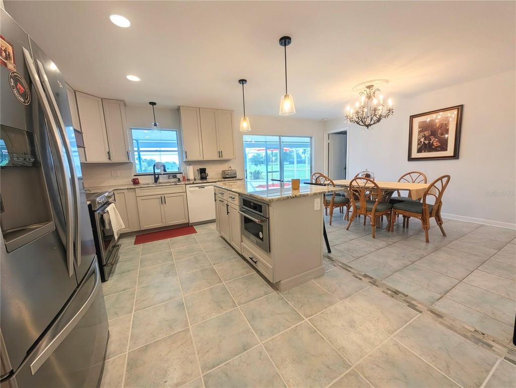 Photo of 50 Caddy Road, Rotonda West, FL 33947 (MLS # TB8515273)
