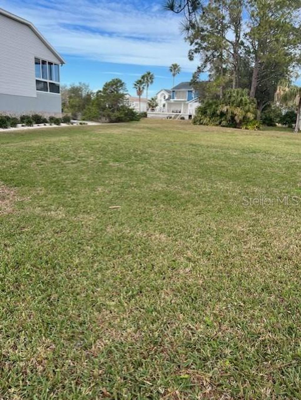 Photo of Harbour Watch Drive, Tarpon Springs, FL 34689 (MLS # TB8337133)