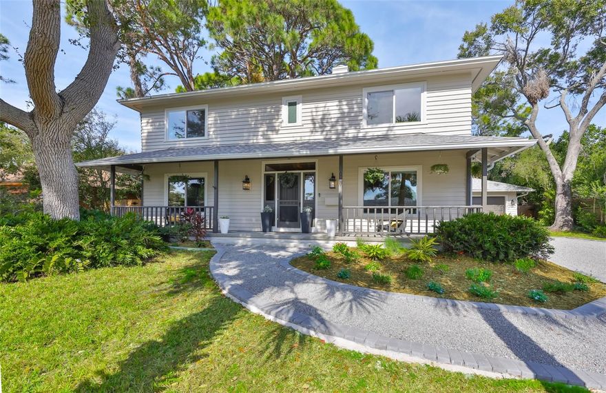 Custom built in 1987 and lovingly owned by the original owner until 2023, this well-maintained home blends timeless character with thoughtful modern updates. Since 2023, numerous improvements have been completed while preserving the home’s original charm and craftsmanship.

Inside, the home offers a spacious yet cozy open kitchen and living area featuring tongue-and-groove wood ceilings, a wood-burning fireplace, and refinished original wood floors. Cedar closets, abundant storage, and a dedicated laundry/mud room add both warmth and functionality. The kitchen and laundry room feature new tile flooring and updated appliances, while both the guest and primary bathrooms have been tastefully improved.

Outdoor living is a standout, with a large screened-in porch measuring approximately 40’ x 12’, along with a covered front porch—perfect for relaxing or entertaining. Additional highlights include a two-car garage with an adjacent workshop area and cedar siding that enhances the home’s classic appeal.

Recent updates include interior and exterior repainting, new blinds throughout, updated baseboards, energy-efficient windows, a roof replacement, electrical and HVAC improvements, a new water heater, new gutters, and an updated front porch.

Located on a quiet street in the well-maintained Greater Pinellas Point neighborhood, the home sits approximately half a mile from Tampa Bay and is situated in Flood Zone X. Enjoy convenient access to major highways, downtown St. Petersburg, and the area’s beautiful beaches.

Spacious, inviting, and full of character, this home is a rare opportunity in a sought-after location.