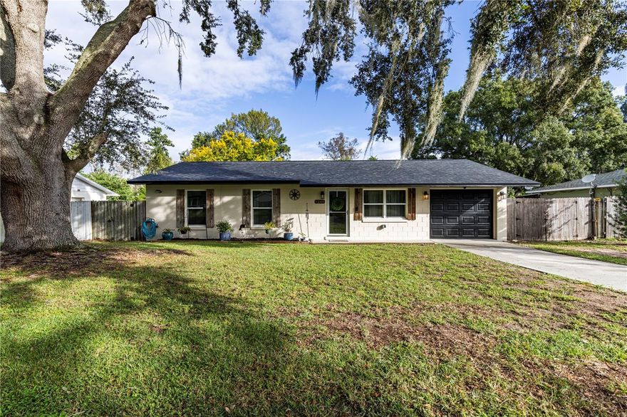 Charming Updated Home in Tavares – Move-In Ready! Welcome to 1240 Cedar Ave, a beautifully updated 3 bedroom, 1.5-bathroom home sitting on a quiet, no-HOA street in the heart of Tavares. This inviting property offers modern updates, comfortable living spaces, and a private backyard retreat — all without rear neighbors! Step inside to find vinyl flooring throughout the kitchen, living room and hallway creating a seamless flow and low-maintenance lifestyle. The updated kitchen is a true highlight, featuring new cabinets, granite countertops and stainless-steel appliances – perfect for cooking and entertaining. Each of the bedrooms are spacious and offer ceramic tile floors and ceiling fans. Both bathrooms have been refreshed with modern vanities and finishes. The exterior of the home shines with fresh paint (10/2025) and a New Roof in 2023, offering peace of mind for years to come. A 1-car garage provides convenient storage, while the sizable backyard with an entertaining patio is ideal for gatherings, relaxing, or enjoying Florida’s beautiful weather – with no rear neighbors for added privacy. Whether you're a first-time homebuyer, downsizing, or looking for an investment opportunity, this move-in-ready home checks all the boxes. Don’t miss your chance to live in a peaceful setting just minutes from Downtown Tavares, local lakes, parks, restaurants and shopping. Schedule your private showing today! All information recorded in the MLS is intended to be accurate however, it should be independently verified by buyer and their agent.