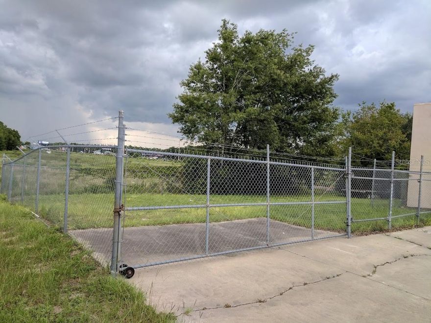 Fenced Laydown Yard for lease conveniently located one block off SW College Rd. near Top of the World.