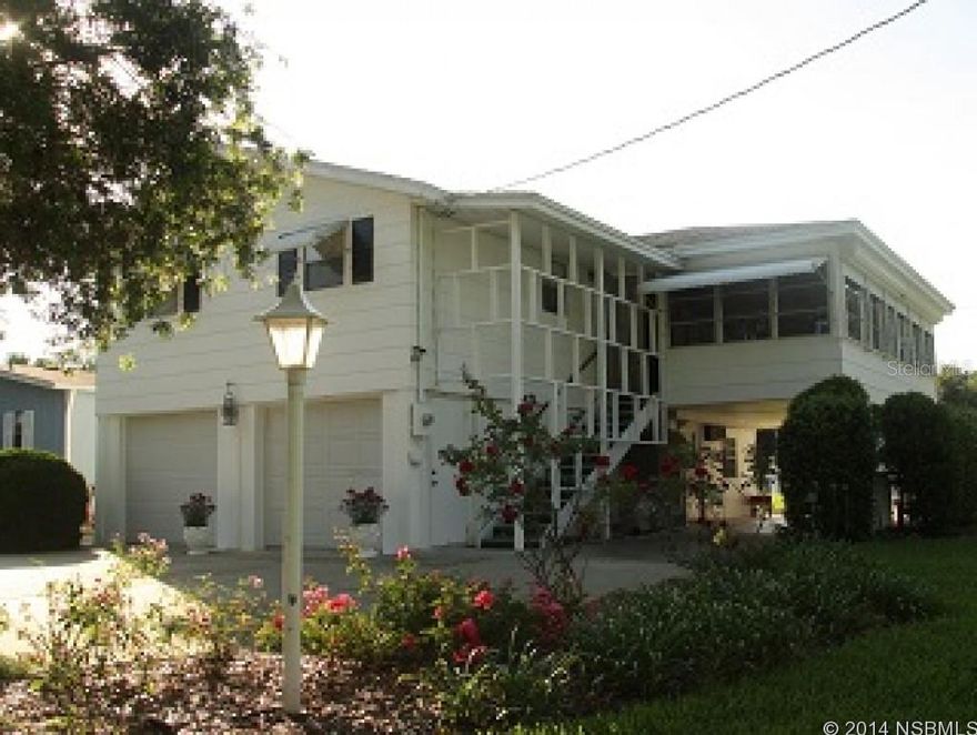 This home is perfect for family, avid fisherman, or retiree looking for a relaxing spot to enjoy your time.  Inside haslots of room and windows for light , even a mother-in-law suite both with panoramic views of the canal.  Outdoors has two docks, fish cleaning station, concrete boat ramp.  Just a quick boat ride to world famous fishing in Mosquito Lagoon.  There is an adjoining lot that may be purchasedseparately. MLS # 1025848 ;Water: City