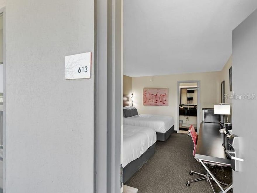 S-613 TURN KEY! (Everything is included in the sale!) A SECOND-FLOOR CITY VIEW Experience our cozy unit located at the Ramada by Wyndham Sarasota in Whitfield, Florida, near Siesta Key Beach, Anna Maria Beach, Lido Key, & many other white sand beaches! Enjoy two queen beds, a full bathroom, a heated pool, and an on-site restaurant. Surrounded by lush shrubbery, our tranquil retreat features a marina for kayaking and boat adventures. Explore nearby Downtown Sarasota for dining, shopping, and entertainment. Relax and enjoy the best of Florida's Gulf Coast! Welcome to the Sarasota Cay Club. This property is approximately two miles north of Sarasota Bradenton International Airport, just minutes from great shopping, museums, art galleries, restaurants, farmers' markets, and other unique entertainment opportunities. This area is also well-known for its destination vacations, boasting some of the best beaches in the country, including Holmes Beach, Coquina Beach, Lido Beach, Longboat Key Beach, and Siesta Key Beach. These privately owned condo residences are in the ‘Ramada By Wyndham Sarasota Waterfront Resort’. Each residence allows daily and short-term rentals with no minimum leasing restrictions. Enjoy staying in these units, which are situated within a waterfront property offering direct access to the Gulf waters. Owners can utilize their condo as a vacation property throughout the year. Enjoy the Ramada Hotel's Resort Lifestyle with amenities that include a newly remodeled onsite waterfront restaurant/tiki bar, ‘Tarpon Bay Grill and Tiki Bar’, heated waterfront pool, beach volleyball, fitness room, roaming security, community laundry, and open common areas. The monthly Condo-Hotel HOA fees include all utilities (Electric, Water, Internet, Cable, Phone, Sewer, and Trash), Exterior Maintenance, and interior common areas, making your overhead expenses minimal and easy to budget. This rare income-producing investment opportunity allows you to enjoy all the amenities of beautiful Southwest Florida.