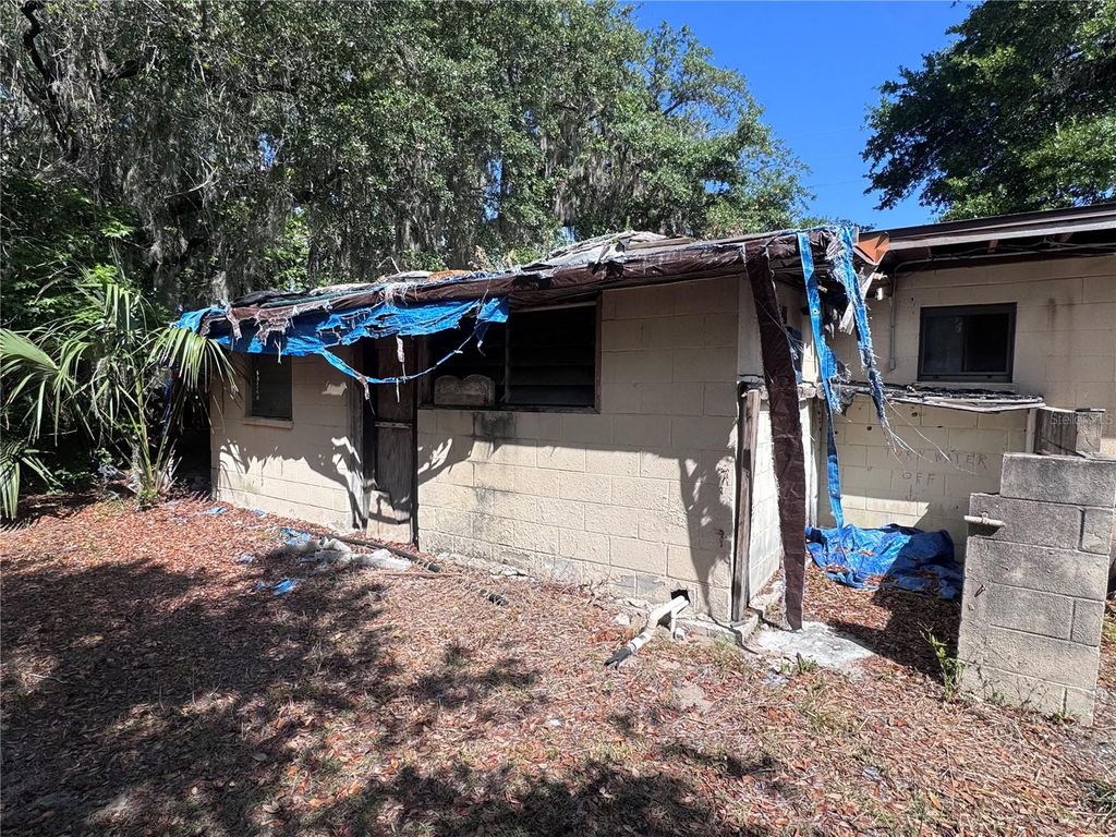 Photo of 1255 Wells Avenue, Tavares, FL 32778 (MLS # O6404241)