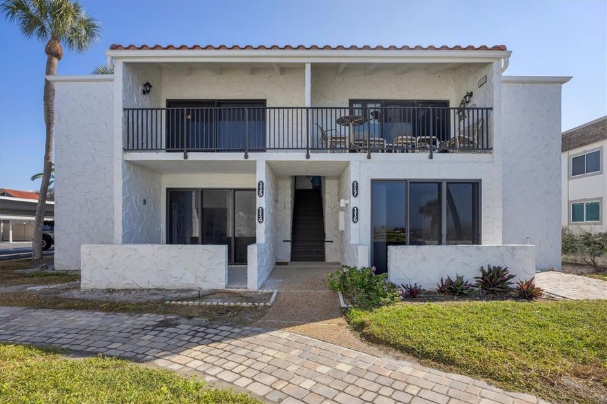 Everything has been updated in this unique 1st floor, Gulf front condo with a beautiful water view. This end unit condo has windows all around, allowing in natural light and luscious views from every room. Walk out onto your private paver patio to catch a Gulf breeze and enjoy your favorite beverage. This condo is a blank slate ready for your decor. New neutral-colored tile, carpet, paint, cabinets, appliances, lighting, fans, closet shelving, etc. There is plenty of guest parking in addition to your covered carport just around the corner. Aldea Mar is the "Village by the Sea," including over 13 acres of grass and tree-lined grounds for walking and enjoying. There is also a putting green, shuffleboard, large community pool and several activities for residents. Aldea Mar allows a pet under 30 lbs and rental with a 30-day minimum, up to 4 times a year. Don't miss this opportunity to own a piece of paradise!