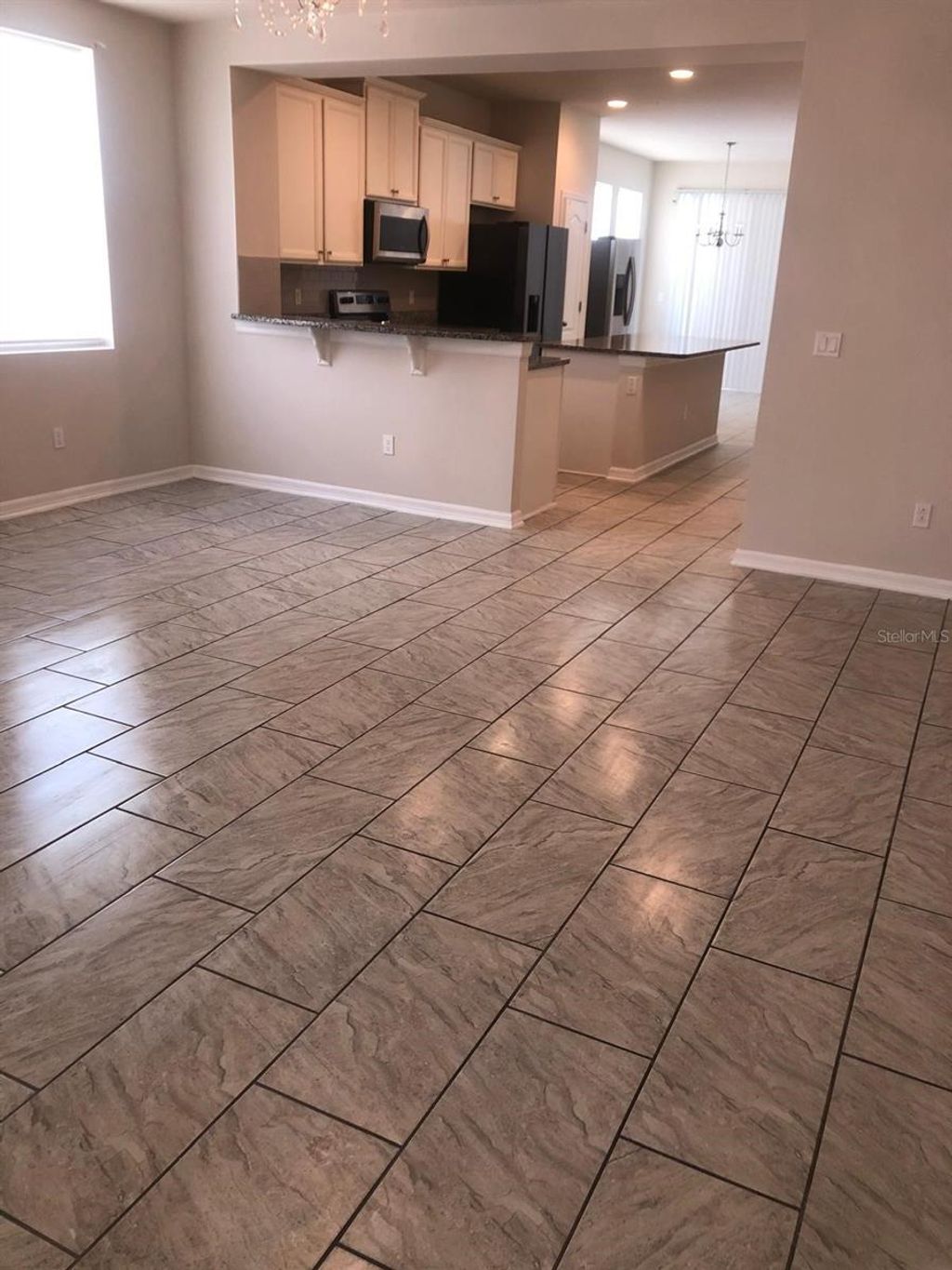 Photo of 5519 Myrtle Pine Lane, Winter Garden, FL 34787 (MLS # O6380094)