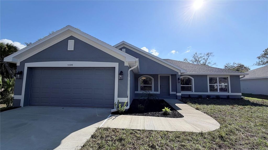 Photo of 5599 Centro Avenue, North Port, FL 34288 (MLS # A4666032)