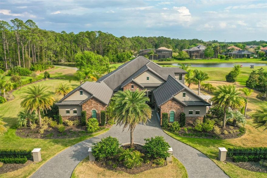 Exquisite ESTATE HOME w/ONE-OF-A-KIND features from 1-acre lot, to full in-home gym, sauna & stunning finishes! With 4 Bedrooms, 4 Baths, an office & bonus room, this TILE roof home was finished TOP NOTCH in 2018 & is being offered FULLY FURNISHED. Move right in! Walk through the GLASS door entry into the OPEN floor plan. Family Room is appointed with GAS linear fireplace, stone wall, coffered ceiling, porcelain tile floors, and stackable/vanishing sliders. Opens onto Kitchen w/oversized QUARTZ island, STAINLESS STEEL appliances & stacked double cabinets. Formal Dining Room finished with faux painting accent, CRYSTAL chandelier & custom drapery. Additional dining in Breakfast Nook w/views of the POOL. Upscale Master Bedroom with 2 WALK-IN closets, trey ceiling with crown molding and en-suite bath. Master Bath finished eloquently with QUARTZ countertop, JETTED tub, bidet, WALK-IN TILE steam shower with mosaic tile accents and personal sauna. Full personal gym with own AC system is off the Master bath for easy use! Downstairs you will find 2 additional grand size bedrooms with each their own full baths. Office anchored at front of home where tile floors continue. Tropical paradise with your SALT water pool w/GAS heated jacuzzi, beautiful waterfall accent, TRAVERTINE lanai & stone accent columns. Completed with outdoor kitchen with gas grill and refrigerator. Upstairs you will find a bonus room with private balcony and full wet bar. 4th Bedroom with access to balcony, walk-in closet, and full bath. This home has been created with the greatest finishes including Impact Anderson windows/doors, foam insulation, TILE roof, over $100k spent on landscaping and gated front entry, courtyard area with pavers lanai, 1000lb propane tank, WHOLE HOUSE GENERATOR & the list goes on! Located on a 1 acre lot with GOLF COURSE views in Plantation Bay Golf and Country Club. This GATED community offers an optional country club membership ranging from 45 holes of golf, tennis, fitness center, 2 restaurants, tiki bar, 2 community pools, pickle ball, bocce ball, and brand new clubhouse to be completed late 2023. Buyers of this home to receive a substantial discount on initiation fee at the country club membership. Ask listing agent for details. Ask for features sheet. This home is being sold COMPLETELY FURNISHED with everything included! Just bring your toothbrush! Professionally decorated and designed.