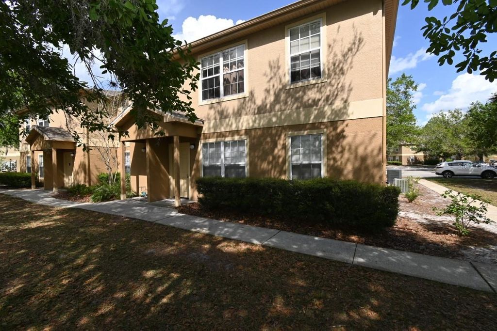 Photo of 36009 Deer Creek Drive #104, Zephyrhills, FL 33541 (MLS # TB8493965)