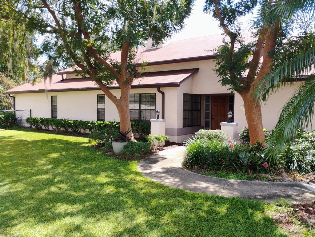 Photo of 411 Glen Abbey Lane, Debary, FL 32713 (MLS # W7879858)