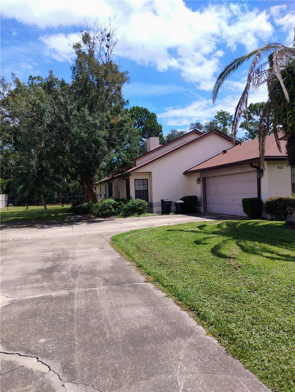 Photo of 411 Glen Abbey Lane, Debary, FL 32713 (MLS # W7879858)