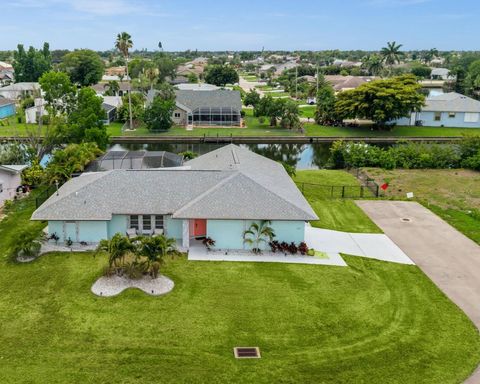 Photo of 2102 SE 8th Street, Cape Coral, FL 33990 (MLS # C7526498)