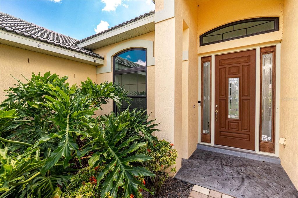 Photo of 455 Firethorn Avenue, Englewood, FL 34223 (MLS # D6143446)