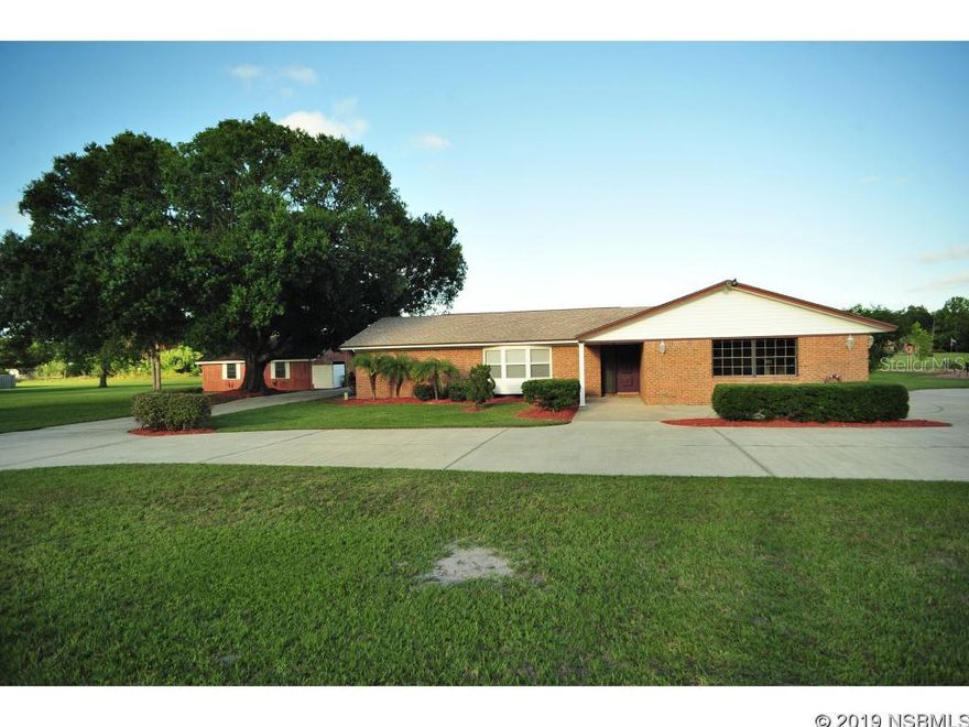 QUIET PLACE IN THE COUNTRY BEAUTIFUL 4 BED 2 BATH HOME ON 1.6 ACRES, OLYMPIC SIZE POOL, STOCKED POND, DETACHED GARAGE,WORKSHOP, HORSE STALLS. NEW CARPET THROUGHOUT, FIREPLACE, CIRCULAR DRIVEWAY, SCREENED BACK PORCH OVERLOOKING POOL, READY FOR NEW FAMILY, MOVE IN READY