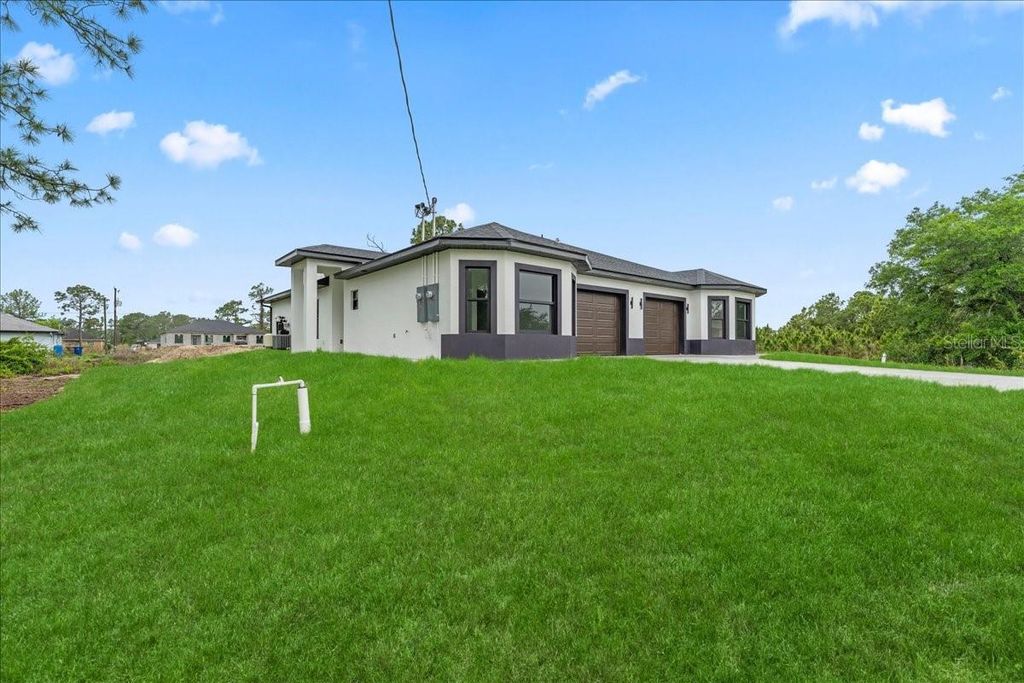 Photo of 4737 25th Street SW, Lehigh Acres, FL 33973 (MLS # TB8495569)