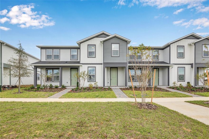 Experience modern living in this stunning 4-bed, 3-bath townhome for lease in Parkside Trails, Clermont. Designed for flexibility, the main level features a full bedroom and bath, ideal for guests or workspace, along with an open gathering room that flows into a sleek kitchen with quartz countertops, and contemporary finishes. Tile flooring throughout the first floor leads to a private courtyard—a perfect extension of your living space for relaxing or outdoor meals.

Upstairs, the home offers three additional bedrooms, including a beautiful owner’s suite with dual quartz vanities, a glass-enclosed shower, and a walk-in closet. Two additional bedrooms, a full bath, and an upstairs laundry room provide everyday convenience, while the rear-load 2-car garage adds valuable storage and functionality.

The location elevates this home even further—situated near a wide variety of shopping, dining, recreation, and entertainment options, including Walmart, Publix, Target, ALDI, Starbucks, Panera Bread, Applebee’s, IHOP, Twistee Treat, Northeast Regional Park, Lake Louisa State Park, Highlands Reserve Golf Club, Margaritaville Sunset Walk, The Promenade, Horizon West, Winter Garden Village, Downtown Winter Garden, and major connecting roadways. Access to signature Central Florida destinations, including the Disney area, adds exceptional convenience.

With its modern design, private outdoor space, and proximity to some of the region’s most vibrant hubs, this home delivers the perfect blend of comfort, style, and connectivity. Request your tour today and secure this exceptional rental before it’s gone!