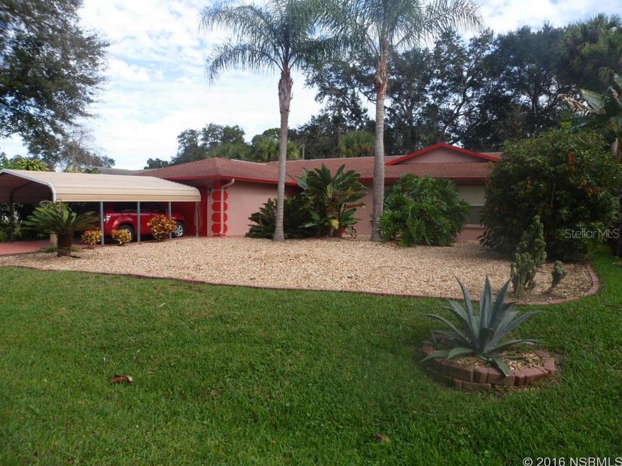 Secluded & Immaculate pool home in Florida Shores. OPEN FLOORPLAN, Special 3BR/2BA/2GAR + 2 car metal carport in front of garage. Tropical paradise with maintenance free yard provides attractive rock & mulch gardens surrounding this beautiful screened pool! Vaulted ceilings, large covered lania/deck around pool. Privacy fence offers quiet & secluded, peaceful atmosphere. Sport pool has 4' at the ends. Termite bond, alarm system, outdoor shower, Kitchen has tiled back splash., newer roof & freshly painted. Front porch overlooks cactus & rock garden . ;Water: City