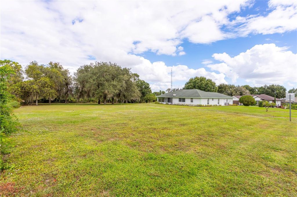 Photo of 308 W Waterway Avenue NW, Lake Placid, FL 33852 (MLS # O6355465)