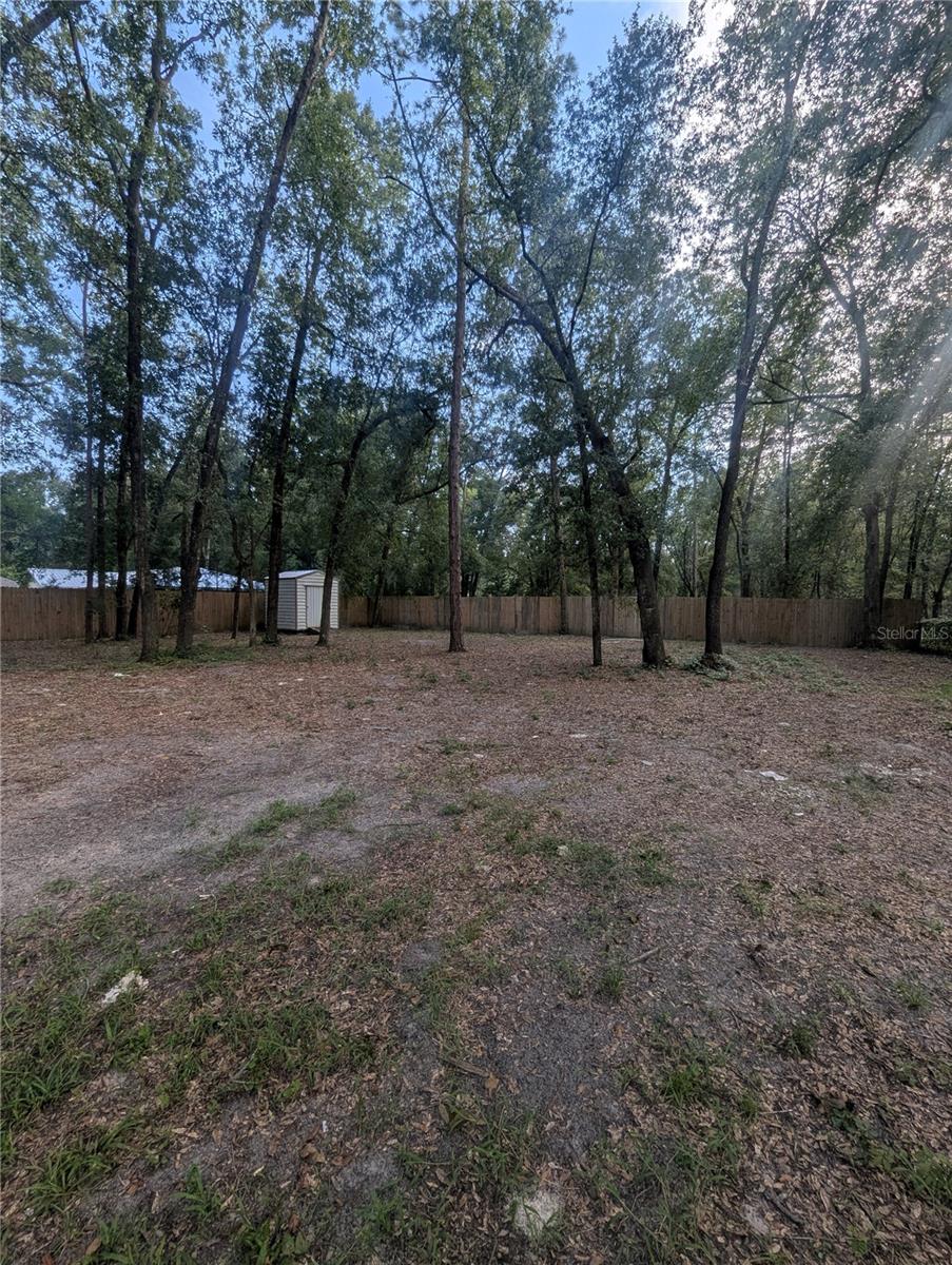 1 acre lot in on cul-de-sac partially cleared and fenced. Sit built homes home minimum sq footage required.