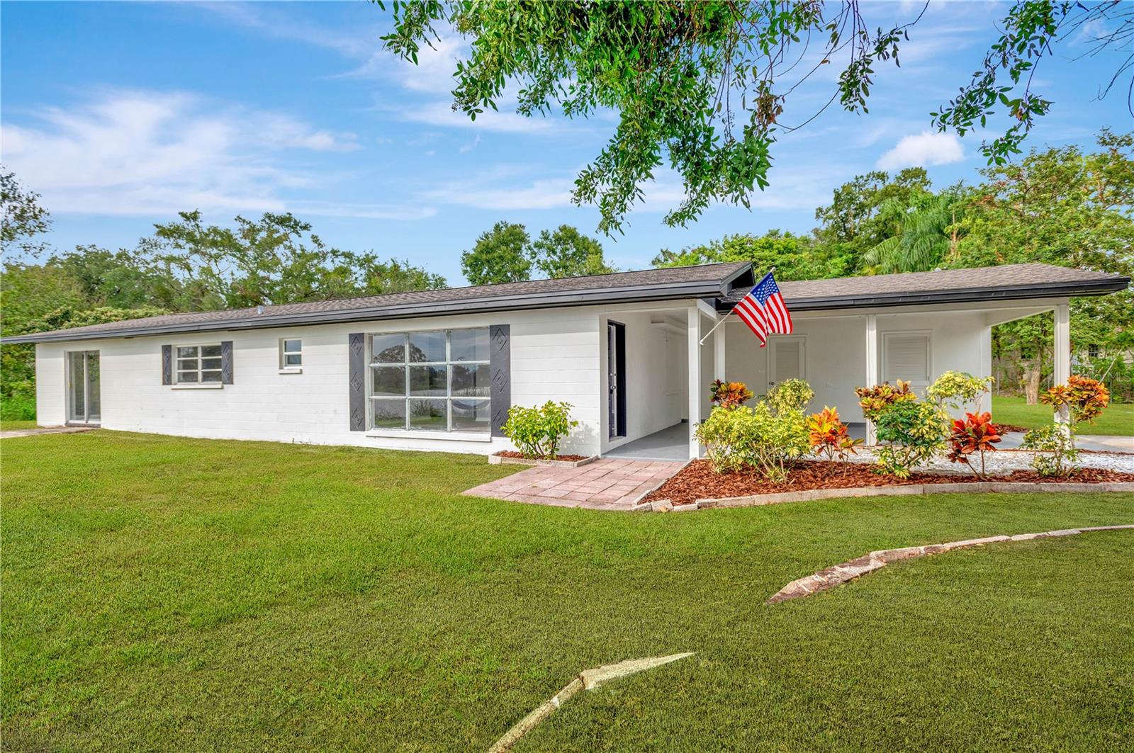 Welcome home to lakefront. You will love this 4 bedroom 2 bathroom home directly on Lake Holloway in Lakeland, FL. It is located on a quiet dead end street on a large private lot. The home has new paint inside and out, new floors, and stainless steel appliances. The location is great as it is just across the beautiful lake from Southeastern University. This home is available for an 18 or 20 month lease. Tenant is responsible for lawncare. Everyone over 18 must apply. Call today to schedule your private tour of this home!