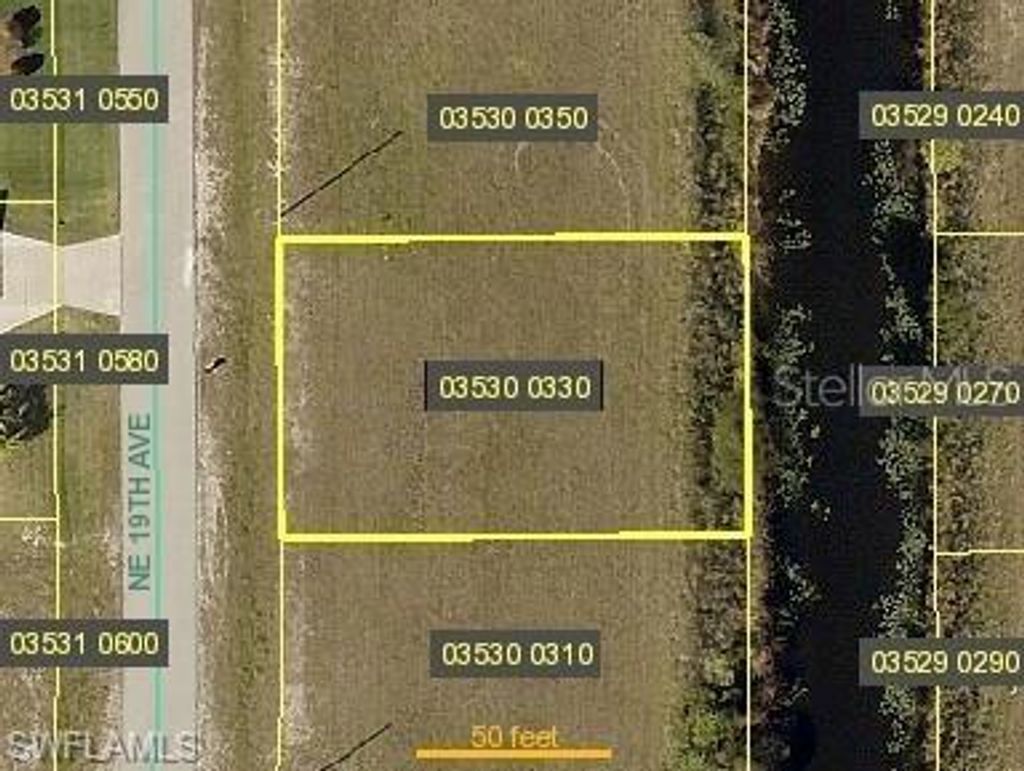 Photo of 1407 NE 19th Avenue, Cape Coral, FL 33909 (MLS # O6304669)