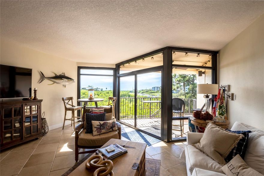 2 BEDROOM & 2 FULL BATHROOM, COMPLETELY REMODELED, FURNISHED, TURN KEY RIVER VIEW UNIT WITH DEEP WATER BOAT SLIP! Everything in this unit is new including A/C & added water softener. Floor to ceilings windows make for maximum views. The gorgeous kitchen has stainless steel appliances, granite counter tops, tile back splash, & large island. Travertine stone flooring through-out & solid hardwood in the bedrooms. 2nd floor balcony has beautiful views of the river & your boat slip where you can access them easily right from your balcony. Key-less entry to your unit that has never been rented. Full size laundry in unit. Marker 33 is a very desirable beachside complex in New Smyrna Beach. It offers your own boat slip #31 that has water & power, Community pool, spa & clubhouse. Covered, reserved parking & guest parking. HOA monthly fee includes Cable, Internet, Building Insurance, Clubhouse, Common Areas, Lawn, Pool & Trash. Minutes to the ocean by boat or walk a few blocks to the beach or Flagler Avenue where you'll find restaurants, shopping, nightlife, events and more! There were 2 recent special assessments that have been paid in full by sellers. One was for a new roof which has been completed and the other was for new material on the dock surface which still needs to be done. ;Water: City