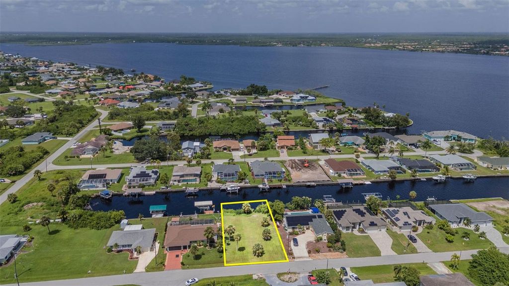 Photo of 12374 Quinlan Avenue, Port Charlotte, FL 33981 (MLS # C7497584)