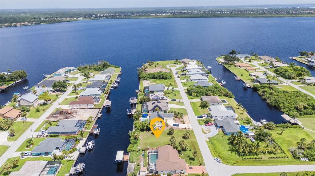 Photo of 12374 Quinlan Avenue, Port Charlotte, FL 33981 (MLS # C7497584)
