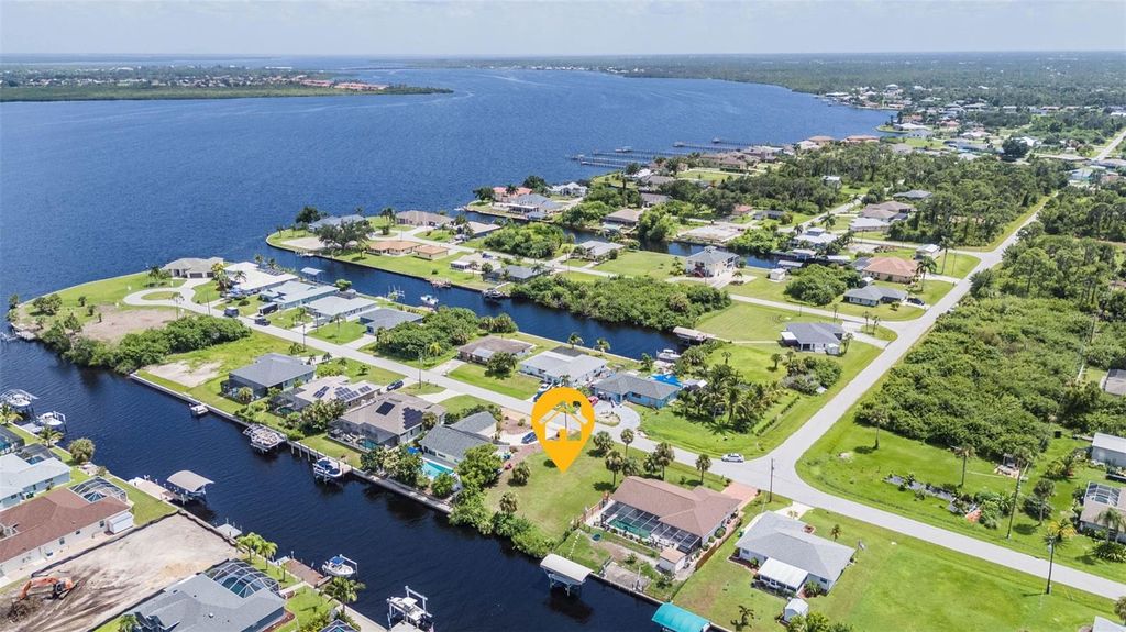 Photo of 12374 Quinlan Avenue, Port Charlotte, FL 33981 (MLS # C7497584)