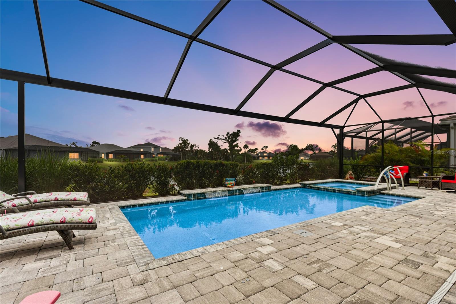 Welcome to just under 3,000 sq. ft. of refined living in this 4-bedroom plus flex room with a game room overlooking the pool and 3 full-bathroom home, oversized lot, built in 2023 and enhanced with upgrades for today’s lifestyle. Set within Grand Palm, recognized as one of the Top 10 Best Master-Planned Communities in the U.S., this residence perfectly balances style, function, and peace of mind.
The open design is filled with natural light and elevated by crown molding, upgraded lighting, and statement chandeliers. The kitchen is equipped with all GE Smart appliances, including a GE Smart dishwasher, and a serving window for effortless entertaining. Hurricane-rated windows, electric shades, and Guardian protection with life alert add both comfort and security.
Step outdoors to your private retreat: a spacious lanai with southern exposure, an 18’ x 34’ saltwater pool, and an 8’ x 8’ spa, all operated remotely through iAqua. There is also a direct entrance to the pool from the bonus room, adding convenience and flow for indoor-outdoor living. Exceptional landscaping, a large lot, and unobstructed views provide privacy and serenity.
Additional highlights include a $20,000 Generac whole-house generator (natural gas), water filtration system, and a second gated entrance for exclusivity.
As a Grand Palm resident, you’ll enjoy resort-style pools, a state-of-the-art fitness center, Adventure Lake with kayak launch, 28 miles of trails, pickleball, tennis, bocce, basketball, volleyball, multiple dog parks, playgrounds, and expansive green spaces.
Homes with this combination of large lot, saltwater pool, spa, southern exposure, and extensive upgrades are rarely available. This is more than a home, it’s a lifestyle and a lasting investment in one of not just Sarasota County’s but the U.S.'s most desirable communities.
Schedule your private showing today and step into the life you’ve been waiting for.