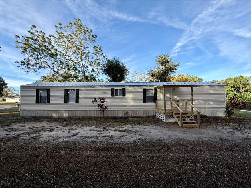 You must see this lovely 2 bedroom 2 bathroom manufactured home located south Lakeland. This remodeled home boasts a new metal roof in 2022, new AC unit in 2022, new flooring, new appliances, a walk in shower, new blinds, new inside paint, and a new porch. The home sits on a large .25 acre cul-de-sac  lot. The property is conveniently located to many shopping centers, parks, grocery stores, and the Polk Parkway for easy commutes to Orlando and Tampa. Set up your showing today before it is gone.