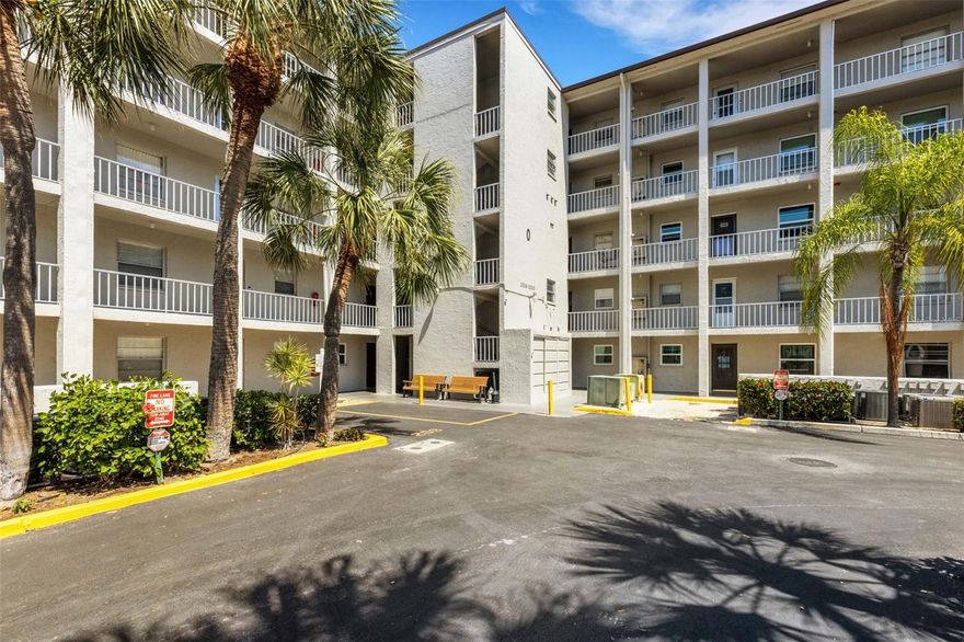 Coastal Retreat in Bayshore on the Lakes!  Whether you’re seeking a full-time residence or a seasonal getaway, you’ll fall in love with this renovated and turnkey-furnished 2-bedroom, 2-bathroom condo in the desirable 55+ community of Bayshore on the Lakes. This beautifully updated 1,144 sq. ft. second-floor unit features an open, modern design with luxury vinyl plank flooring flowing throughout. The stylish kitchen offers newer white shaker-style all-wood cabinetry with a lazy Susan, stunning quartz countertops, a contemporary tile backsplash, and upgraded stainless steel appliances less than three years old. A newer faucet, garbage disposal and lighting complete the space with a fresh, modern touch.  Both bathrooms have been tastefully remodeled with updated vanities, tile flooring, and sleek fixtures, creating a spa-like feel. Enjoy the comfort of newer ceiling fans and light fixtures throughout, adding to the home’s bright and inviting atmosphere.  Step out to your private balcony—finished with an epoxy-painted floor and a convenient storage closet housing a full washer and dryer.  Bayshore on the Lakes offers a wealth of amenities including a heated pool and spa with newly upgraded pavers and lighting, a clubhouse, shuffleboard courts, outdoor grills and picnic areas, a car wash station, and a peaceful fishing pier. With low HOA fees that include internet and basic cable, this community delivers exceptional value.  Additional conveniences include an elevator in the building, a reserved parking space, and rental opportunities available after two years of ownership.  Ideally located in central Bradenton, you’ll be just minutes from shopping, dining, and the pristine beaches of Anna Maria Island.  Don’t miss your chance to own this beautifully renovated slice of paradise in Bayshore on the Lakes—schedule your private showing today!