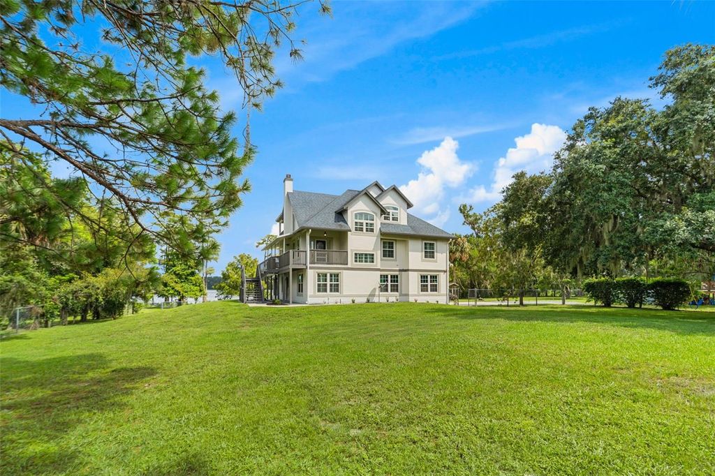 Photo of 16692 Lake Pickett Road, Orlando, FL 32820 (MLS # O6353074)