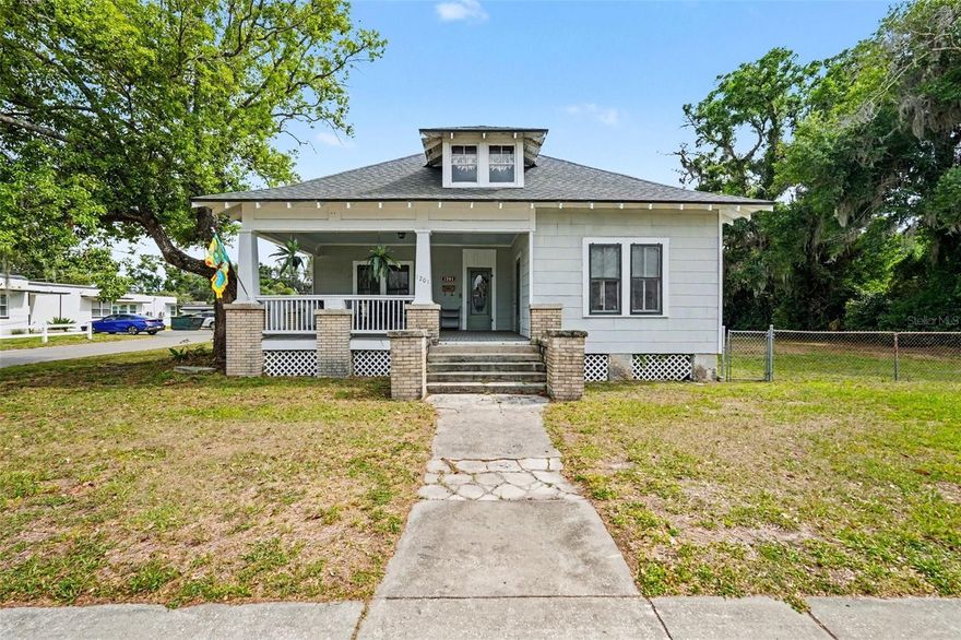 A CENTURY OF CHARACTER MEETS A FUTURE OF OPPORTUNITY. Nestled on 0.53 acres in the heart of Plant City, this 1920s Craftsman is a rare fusion of meticulously preserved history and robust updates: NEW ROOF (2021), NEW UPSTAIRS HVAC (2025), updated plumbing/electric, and a 2012 water heater. The interior showcases breathtaking craftsmanship: original Heart Pine floors, 10ft ceilings, and fluted casings. Rare features include a cedar-lined closet and an upstairs "restoration kit"—the full set of original solid wood doors kept in safe storage. The chef’s kitchen flows into a massive L-shaped Butler’s Pantry. Retreat to the primary suite with a walk-in closet or the expansive upstairs bedroom with huge attic expansion potential. Outside, your private R-2 zoned compound features a screened pool (2006), detached workshop, and double carport. NO HOA/CDD. Walkable to downtown—this is the low-maintenance historic lifestyle you’ve been waiting for. Own the land, the history, and the potential!