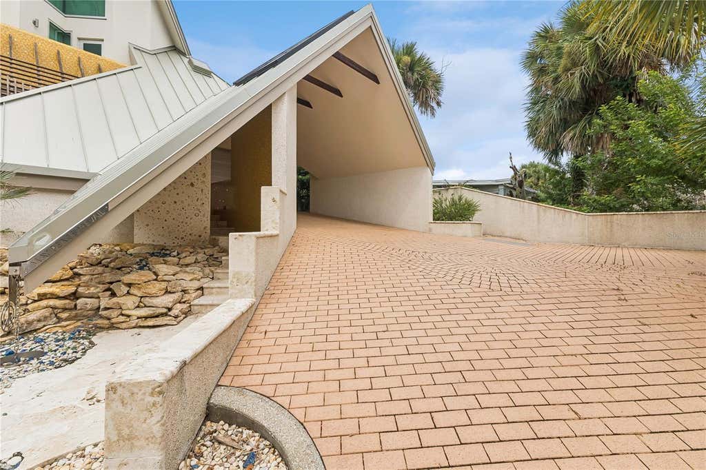 Photo of 1800 N Peninsula Avenue, New Smyrna Beach, FL 32169 (MLS # O6431814)