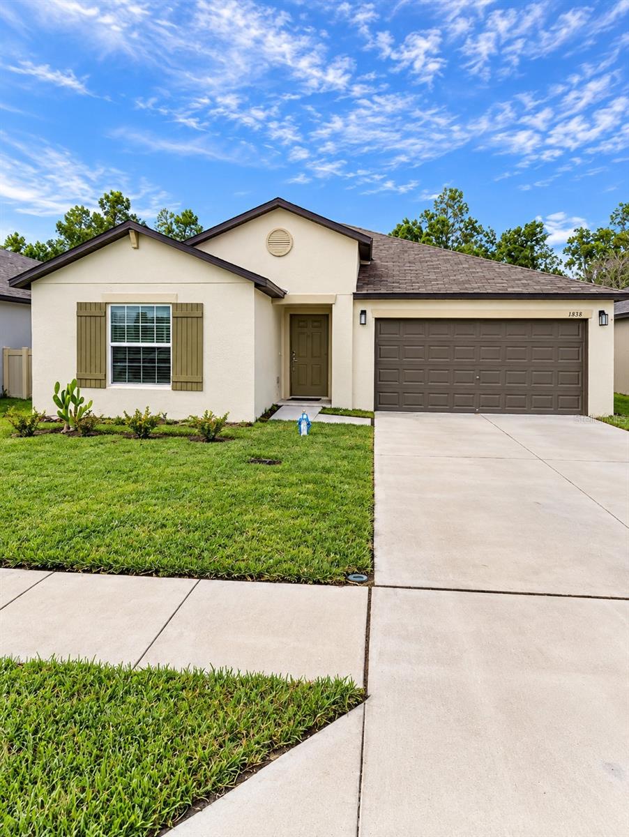 Photo of 1838 Red Loop, Lakeland, FL 33801 (MLS # O6442777)