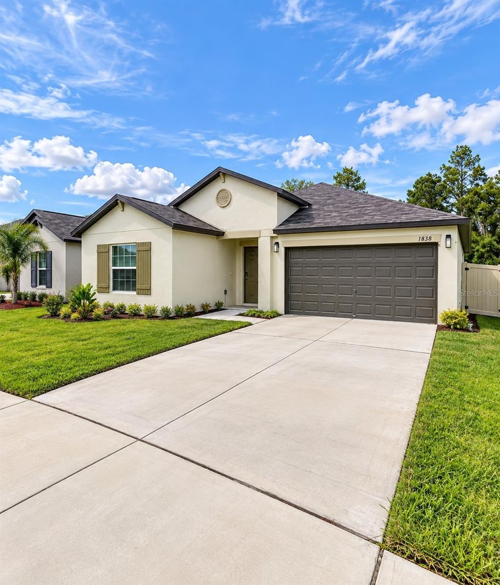 Photo of 1838 Red Loop, Lakeland, FL 33801 (MLS # O6442777)