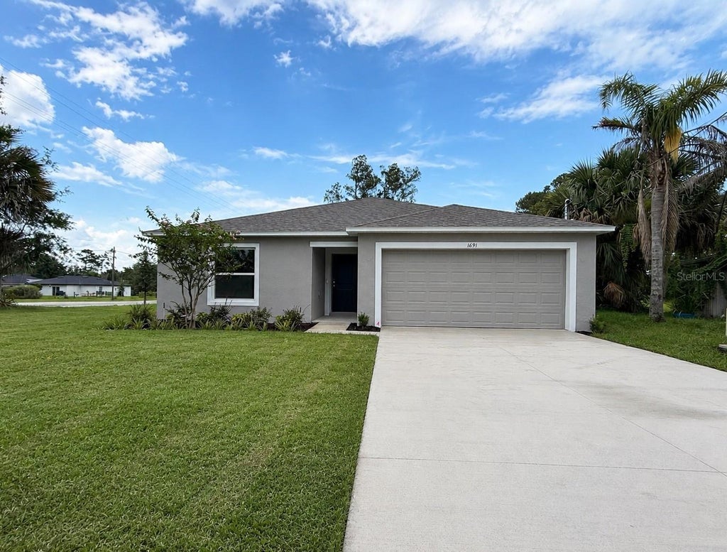 Photo of 3112 E May Street, Inverness, FL 34453 (MLS # O6449584)
