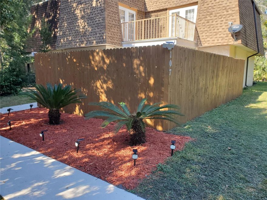 Secluded townhouse with No HOA. Private, located off the street. Turn key unit. Old, majestic oaks with Spanish moss grace this area offering shade relief on hot Florida days & saves on electricity. Conveniently close to grocery stores, gas stations, car wash, restaurants, shopping and main streets, as well as 10 minutes to the Interstate Hwy. Unit has fireplace in large living room, large kitchen with ceramic cooktop, newer washer, dryer & D/W, sliding glass Pella doors with sliding screens in both LR & Kitchen allow easy access to patio. Deep closet off kitchen with hooks for jackets & plenty of room for brooms, etc. Upstairs offers 2 bedrooms with shared balcony & bath. Large Master BR offers 2 large closets. Large storage closet at top of stairs. Linen closet in hall. Newer A/C & water heater.