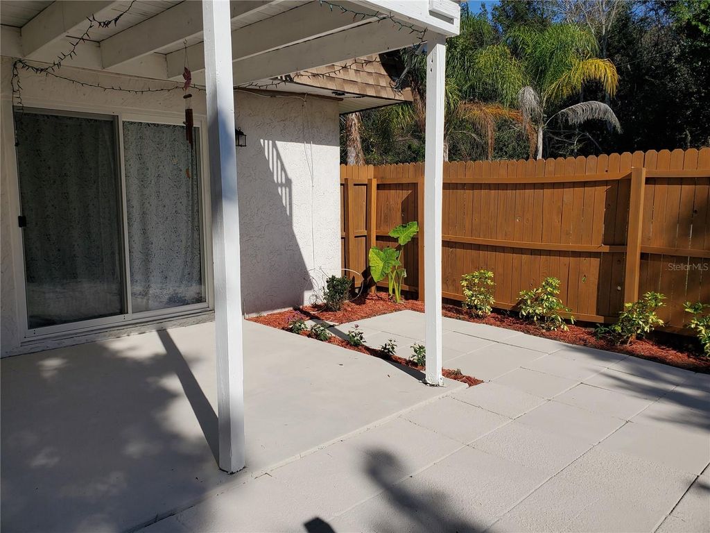 Photo of 107 Springwood Square, Port Orange, FL 32129 (MLS # O6368094)